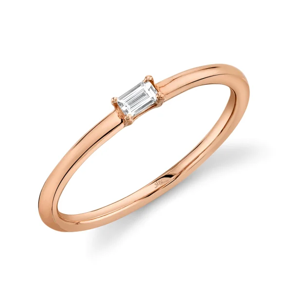 SC22004978_1200x The Emma Ring is a delicate rose gold band featuring a single horizontally set baguette-cut diamond at the center.
