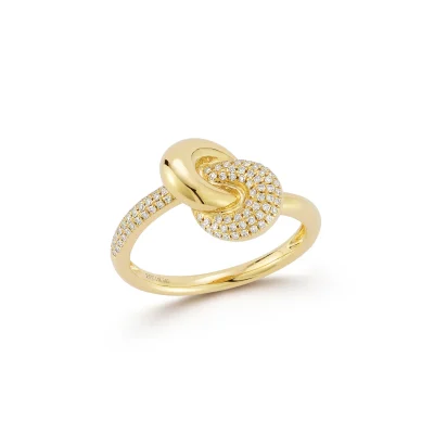 The Diamond & Gold Jumbo Love Knot Ring features an interlocking knot design with one side encrusted with diamonds, the other polished smooth, and a band partially set with diamonds.