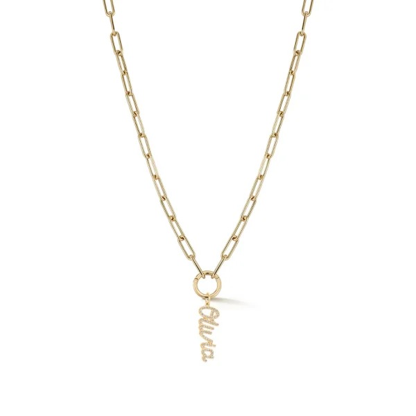 The Lola Enhanced Script Initial Chain Necklace features elongated gold links, a small circular connecting ring, and a sparkling "chill" cursive pendant, shown against a plain white background.