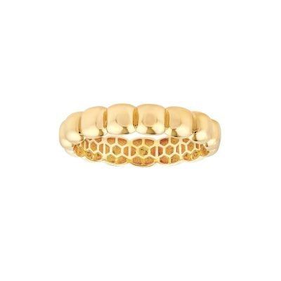A gold ring with a rounded, smooth, segmented design on top and a honeycomb pattern on the inner band, shown against a plain white background.